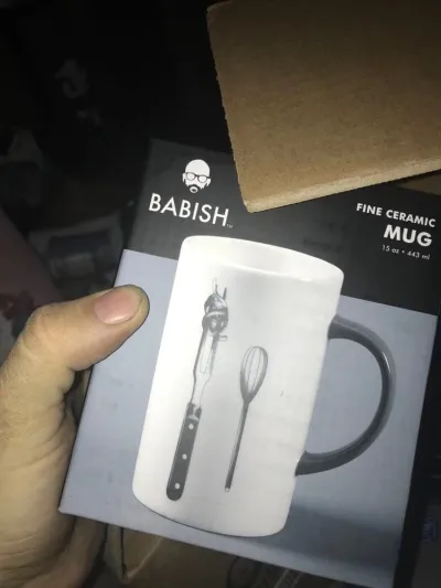 Wrist extender and a Babish Mug